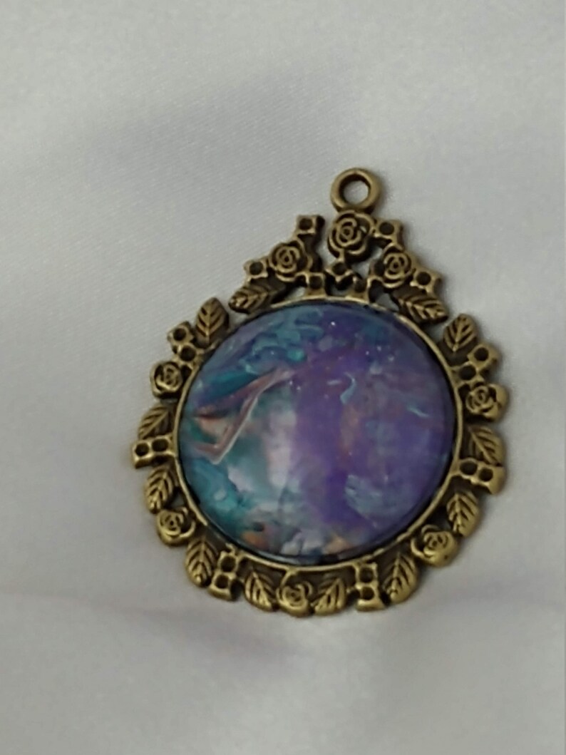 Teal Pendant Purple metallic swirl framed in bronze roses