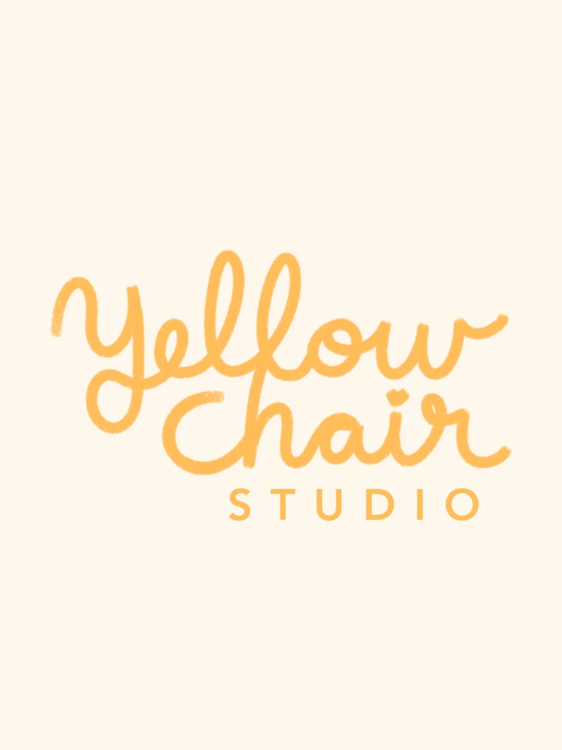 May include: Yellow Chair Studio logo with a handwritten font in orange.