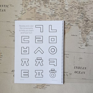 May include: A black and white worksheet with the text "Review and color the consonants to help you learn and have fun!" and a series of geometric shapes representing different letters of the alphabet.