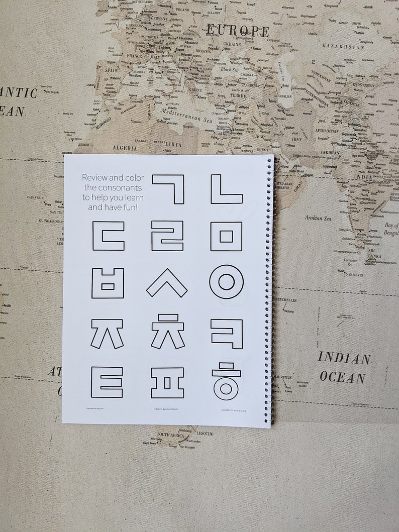 May include: A black and white worksheet with the text "Review and color the consonants to help you learn and have fun!" and a series of geometric shapes representing different letters of the alphabet.