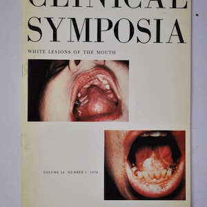 May include: A vintage copy of "Clinical Symposia" journal. The cover displays the title in large black letters, with the subtitle "White Lesions of the Mouth." Two images of open mouths are shown. The journal's volume and year are also printed.