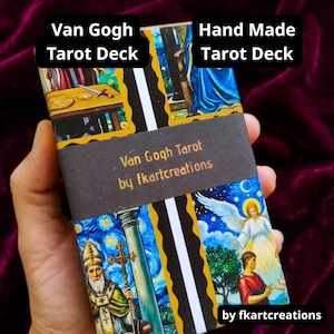 May include: A rectangular tarot deck box featuring colorful artwork inspired by Van Gogh, with a black paper band across the center labeled Van Gogh Tarot by fkartcreations. The deck displays various illustrated figures and starry night motifs.