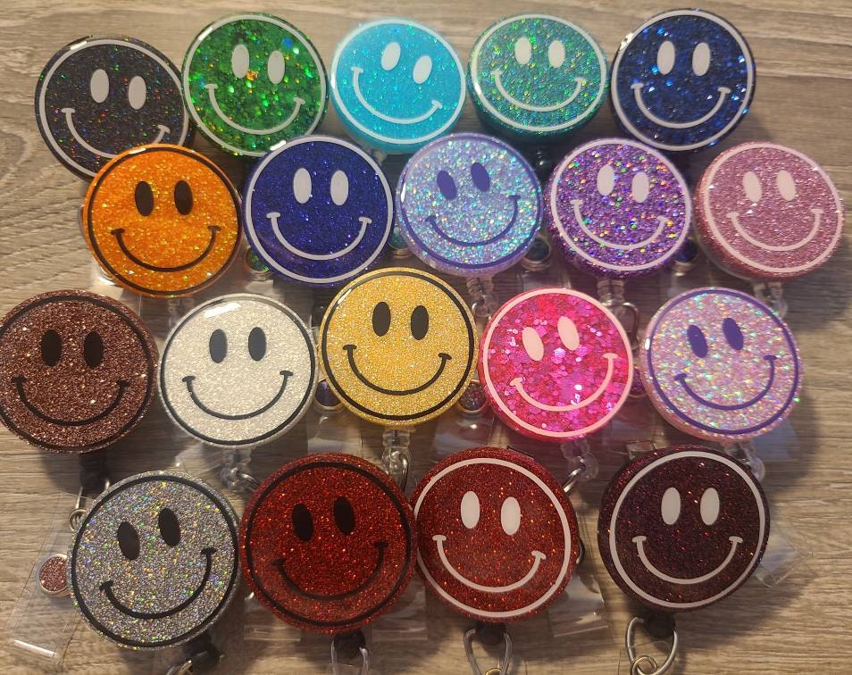 Happy face badge reel, smiley face badge reel, retractable badge reel