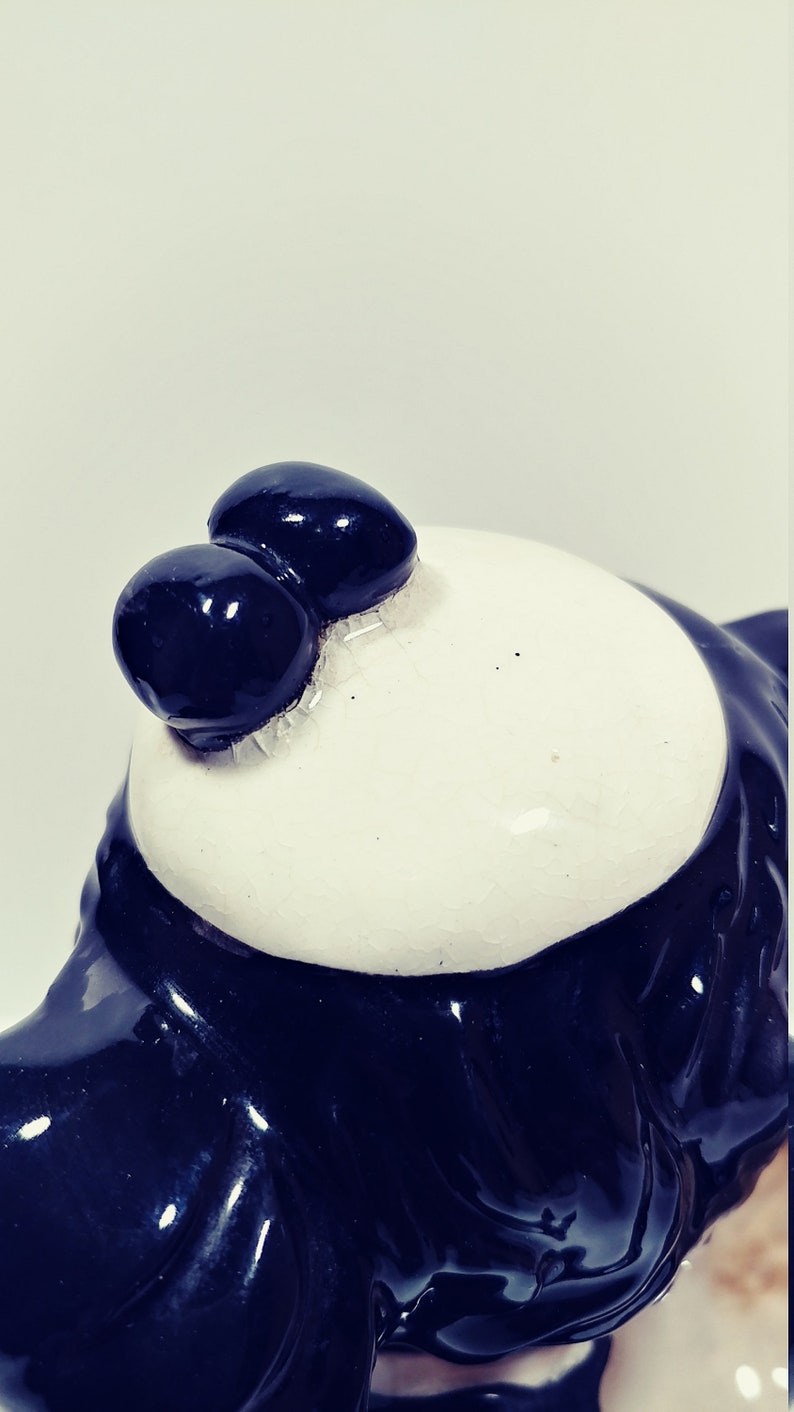 Vintage black and white winking puppy with bow tie and hat planter