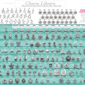 May include: A comprehensive catalog page titled Charm Library, displaying a wide variety of silver-toned metal charms arranged in rows. The collection includes alphabet letters, zodiac symbols, and sea-themed icons, with a vertical 10-inch ruler on the right.