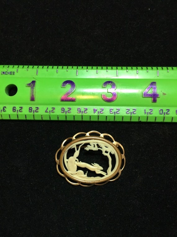 Vintage French celluloid brooch