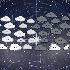 May include: A collection of white and gray cloud-shaped buttons arranged in a semi-circle pattern on a dark blue background with a starburst design.