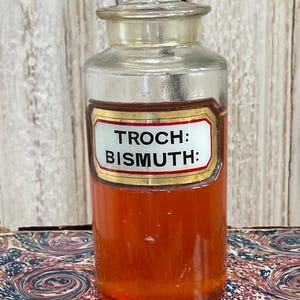 Antique French apothecary bottle with label and glass stopper @1870