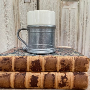 Vintage Wilton Armetale Pewter mugs with Ironstone insert. Set of 2