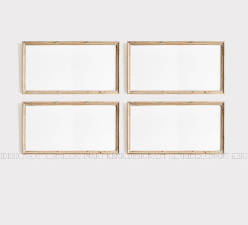 May include: Four empty, light brown wooden picture frames are arranged in a grid pattern on a white wall. The frames are all the same size and shape, and they are all oriented horizontally.