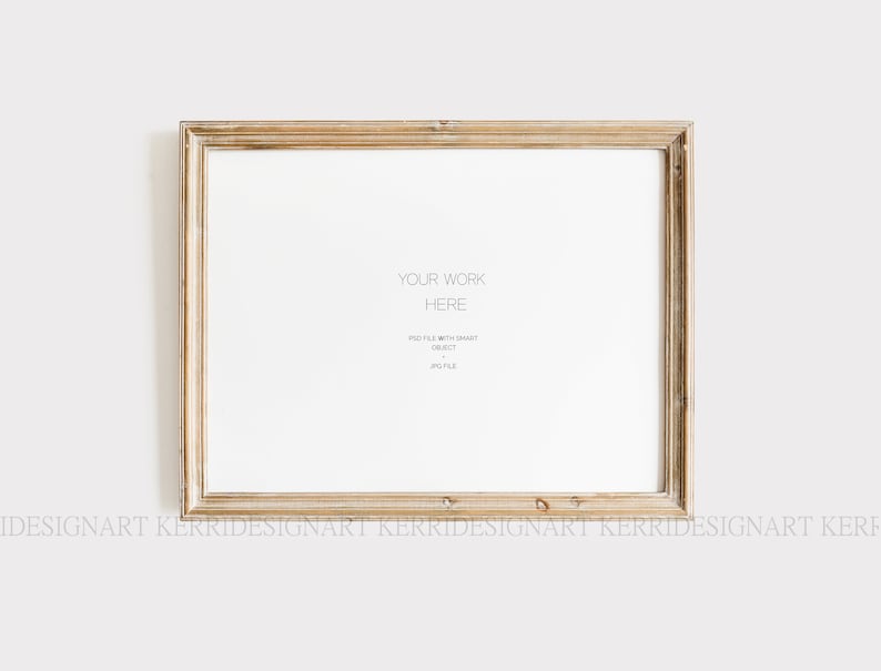 May include: A rectangular, light-colored wooden picture frame with a distressed finish. The frame surrounds a white space with the text "YOUR WORK HERE" and other details. The frame is set against a plain white background.