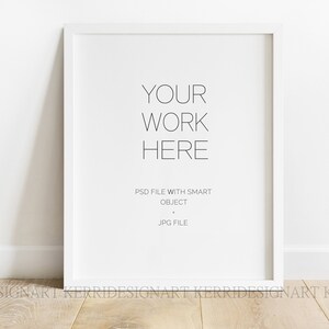 Pode incluir: Mockup de moldura branca com o texto "YOUR WORK HERE" e o texto "PSD FILE WITH SMART OBJECT JPG FILE" abaixo.