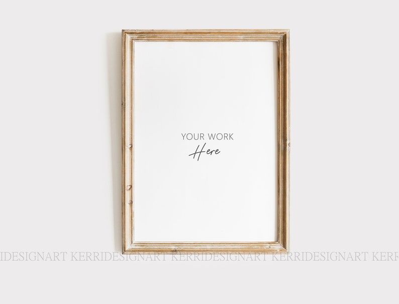 May include: A light wood picture frame with a white mat and the text "YOUR WORK Here" in black.