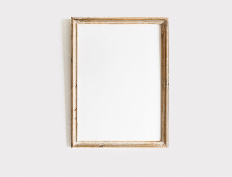 May include: A simple, wooden picture frame with a light brown finish. The frame is empty and ready to be filled with a photo or artwork.