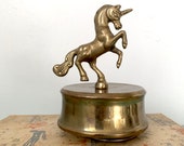 Brass unicorn music box