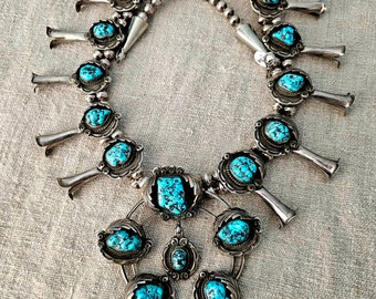 Big Nuggets of Sleeping Beauty Turquoise Stones on this Vintage Squash Blossom Necklace Old Pawn