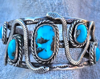 Fantastic Snake Cuff 2 Curling Snakes with Rattles Morenci Turquoise Sterling Native Made Vintage Cuff A J Nieto
