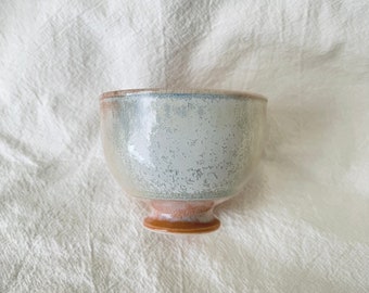 Handmade ceramic tea cup blue and orange glaze