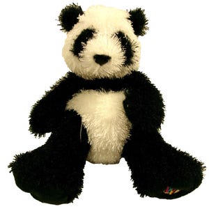 May include: A plush panda toy featuring a shaggy, textured black and white faux fur coat. The stuffed animal has a white face with black patches around the eyes, black ears, black limbs, and a white chest area, sitting in an upright position.