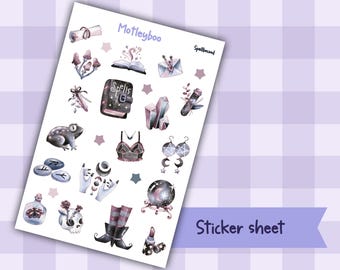 May include: A sticker sheet featuring watercolor illustrations of mystical items. The sheet includes images of a spell book, crystals, a frog, a crystal ball, and other magical elements. The text "Motleyboo" and "Spellbound" are visible.