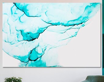 May include: Abstract art print featuring a blue and white watercolor design. The design resembles flowing water or clouds. The print is framed and hanging on a white wall.
