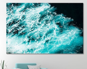 May include: Abstract art print featuring a close-up of turquoise blue water with white foam, creating a swirling pattern.