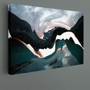 May include: Abstract art print featuring a swirling, white shape that resembles a face, set against a backdrop of a mountain range and a lake. The colors are muted and include shades of blue, green, and brown.