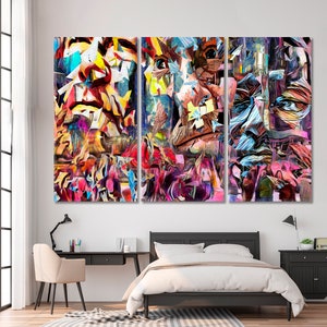 May include: Abstract art print featuring three panels with a colorful, geometric design of a face. The artwork is in shades of pink, blue, yellow, green, and orange.