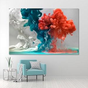 May include: Abstract art print featuring a colorful explosion of red, blue, and white paint in water. The colors are vibrant and create a dynamic and energetic composition.