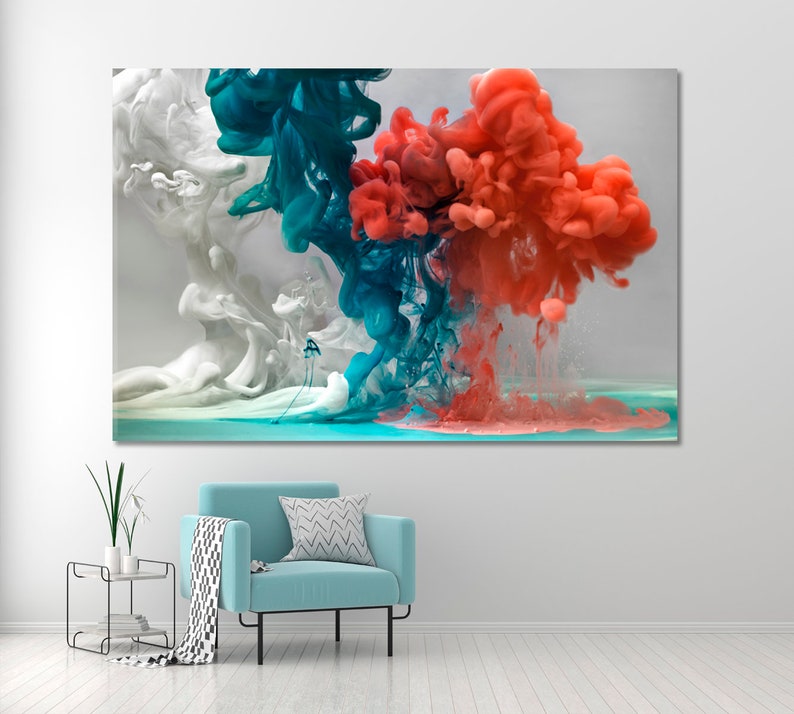 May include: Abstract art print featuring a colorful explosion of red, blue, and white paint in water. The colors are vibrant and create a dynamic and energetic composition.