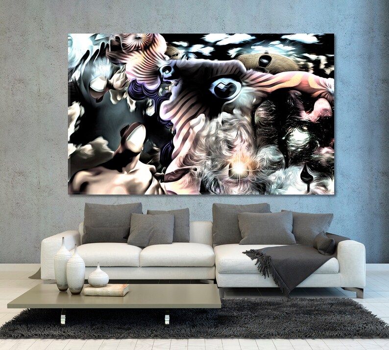May include: Abstract art print featuring a surreal composition of swirling forms, eyes, and figures in shades of black, white, and beige. The artwork is displayed above a white sofa with gray pillows, a gray coffee table, and a dark gray rug.