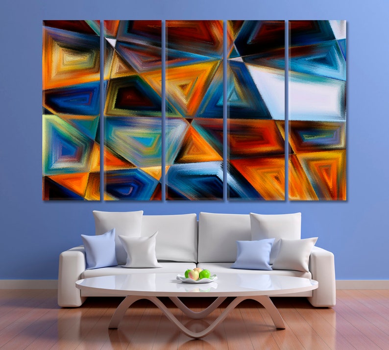 May include: Abstract art print with a multi-panel design. The print features a geometric pattern of triangles in shades of blue, orange, yellow, and red.