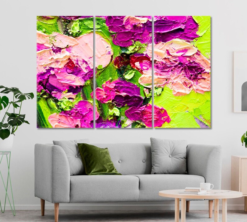 May include: Abstract painting of pink and purple flowers on a green background. The painting is divided into three sections.
