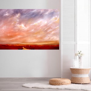 May include: A painting of a red landscape with a winding road leading to a small house in the distance. The sky is a vibrant mix of pink, orange, and purple with fluffy white clouds.