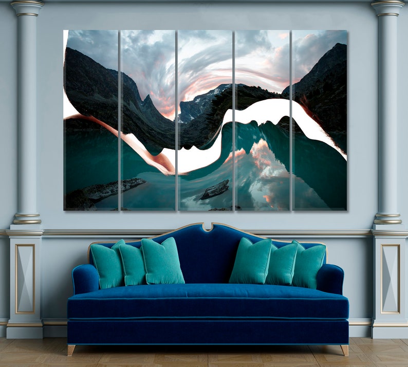 May include: Abstract art print featuring a mountain range reflected in a lake. The image is split into five panels, with a white, wavy line running through the center. The colors are teal, blue, and white.