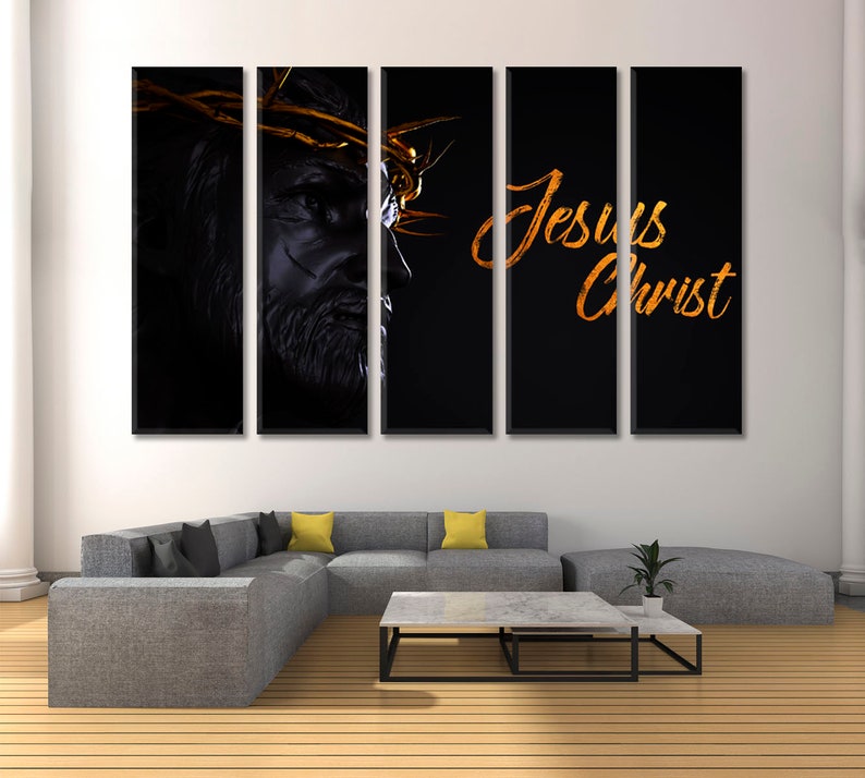 May include: A five-panel canvas print featuring a black and white image of Jesus Christ with a golden crown of thorns. The text "Jesus Christ" is written in gold script on the right side of the print.