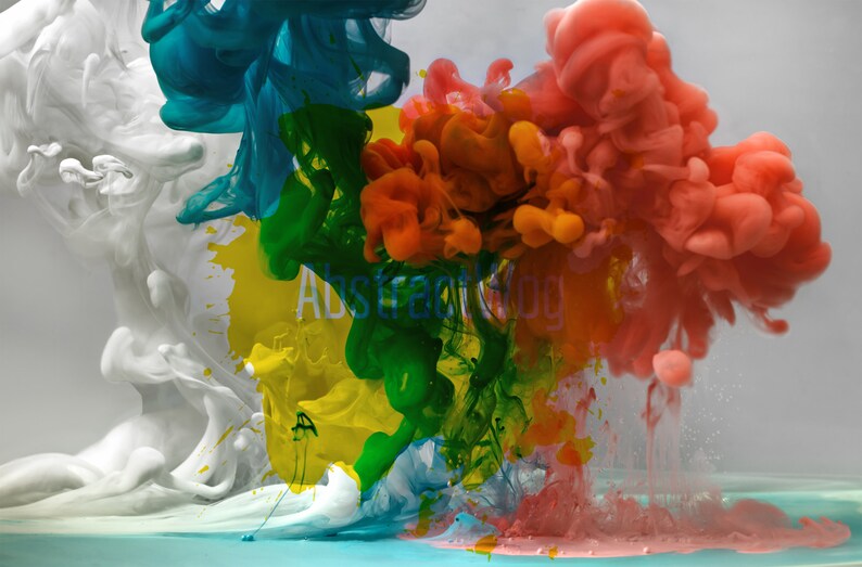 May include: Abstract art photograph of colorful ink swirling in water. The colors are white, blue, green, yellow, orange, and pink.