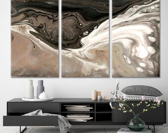 May include: Abstract art print with a black, white, and brown swirling pattern. The print is divided into three panels.