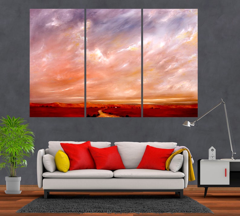 May include: A three-panel canvas print depicting a landscape with a red and orange sky, white clouds, and a winding road leading to a distant horizon.