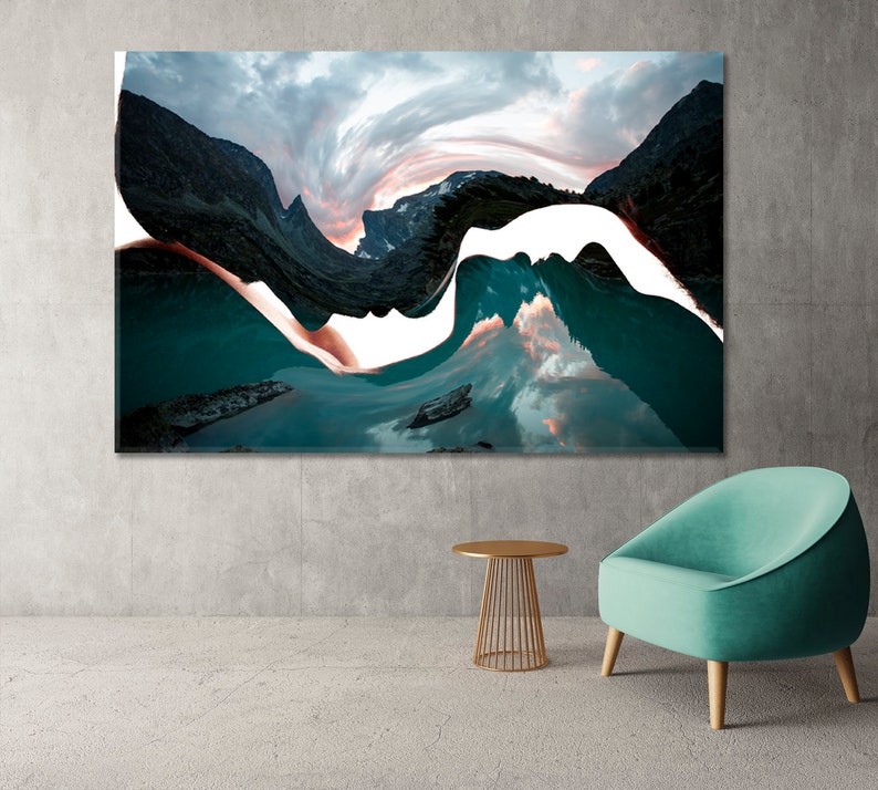 May include: Abstract art print featuring a swirling, distorted landscape with mountains, a lake, and a sky with pink and orange clouds. The image is split in half by a white, wavy line.