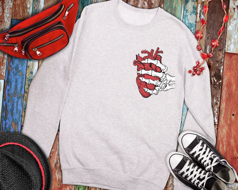 heart in skeleton hand svg file svgpngjpg instant download