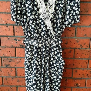 1980s to 1990s floral belted dress with shoulder pads and lace collar
