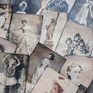 May include: A collection of rectangular cards featuring sepia-toned vintage photographs. The images depict various subjects including a ballerina in a tutu, the Statue of Liberty, portraits of individuals, and a group of children in formal attire.