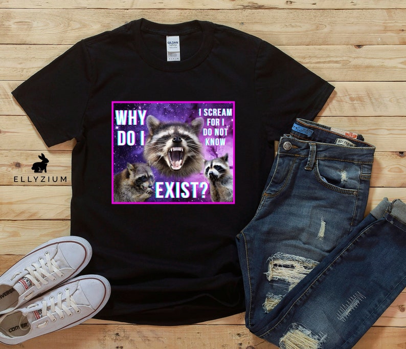 May include: Black t-shirt with a graphic of three raccoons in a galaxy background. The text on the graphic reads "Why do I exist? I scream for I do not know."