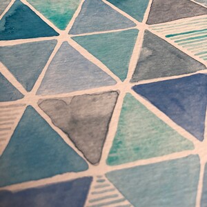 May include: Abstract watercolour painting with a geometric pattern of triangles in shades of blue and green.