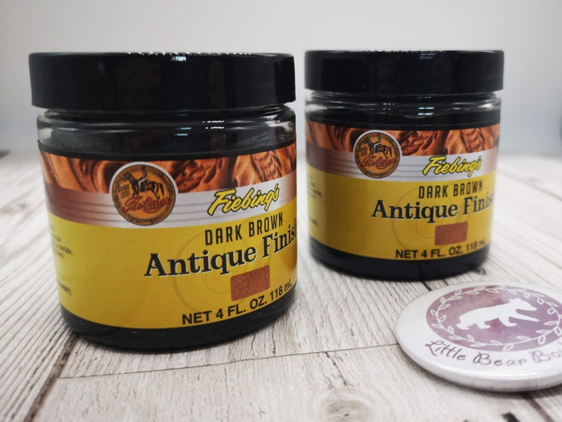 May include: Two bottles of Fiebing's Dark Brown Antique Finish leather dye. Each bottle contains 4 fluid ounces (118 ml).