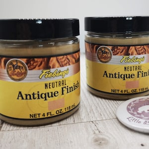 May include: Two glass jars of Fiebing's Neutral Antique Finish leather dye. Each jar contains 4 fluid ounces (118 ml) of dye.