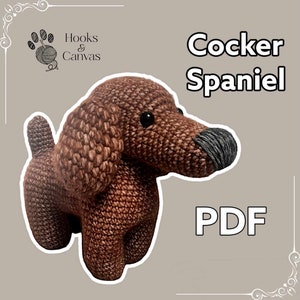May include: Crochet pattern PDF for a brown Cocker Spaniel dog. The pattern is from Hooks & Canvas.