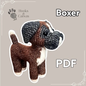 May include: Crochet pattern for a brown and white Boxer dog. The pattern is available as a PDF download. The pattern is from Hooks & Canvas.