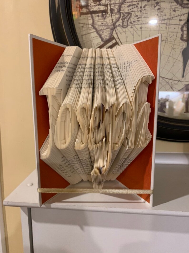 Combination cut and fold style Personalized folded book art